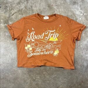 Urban Nation Burnt Orange Cropped “Road Trip”Graphic Tee
Size: Medium